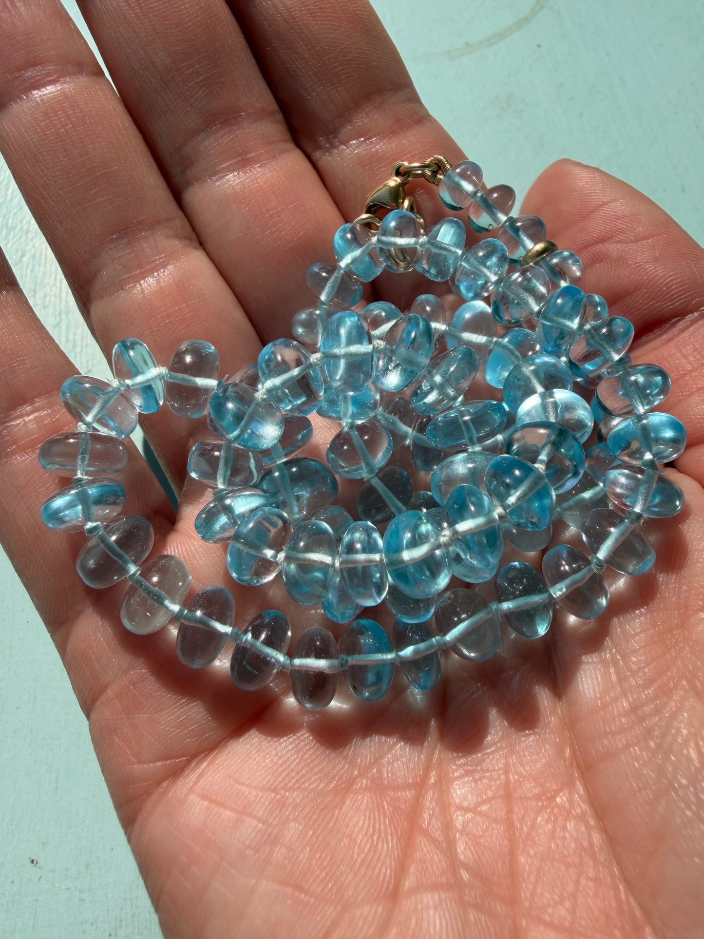 Sky Blue Blue Topaz Knotted Strand, 14k Gold