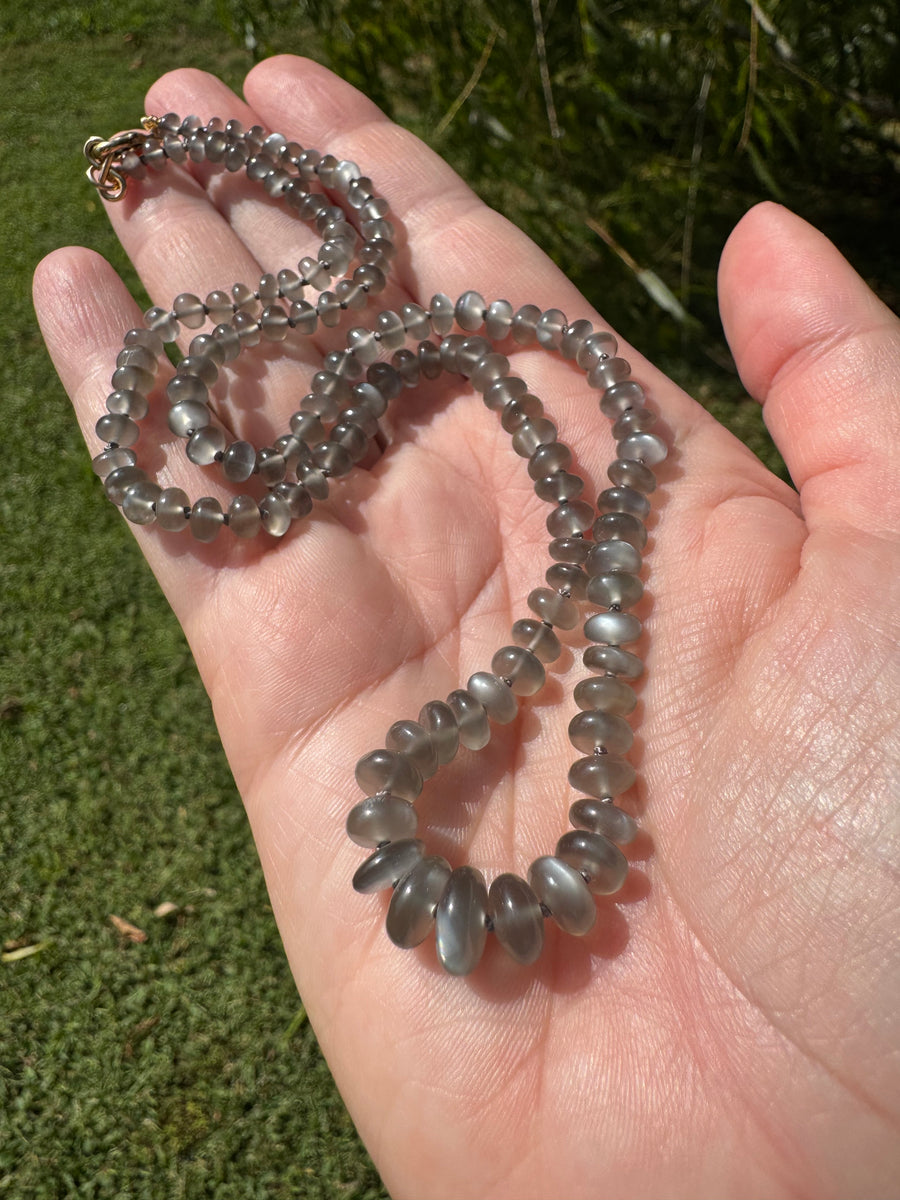 Detail of a platinum moonstone strand by Brittany Myra Jewelry