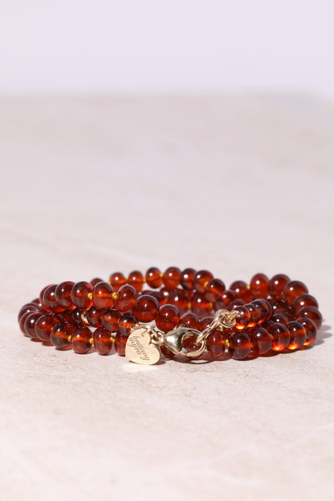 Amber Fire, Hessonite Garnet Strand in 14k Gold, a close look at the stones