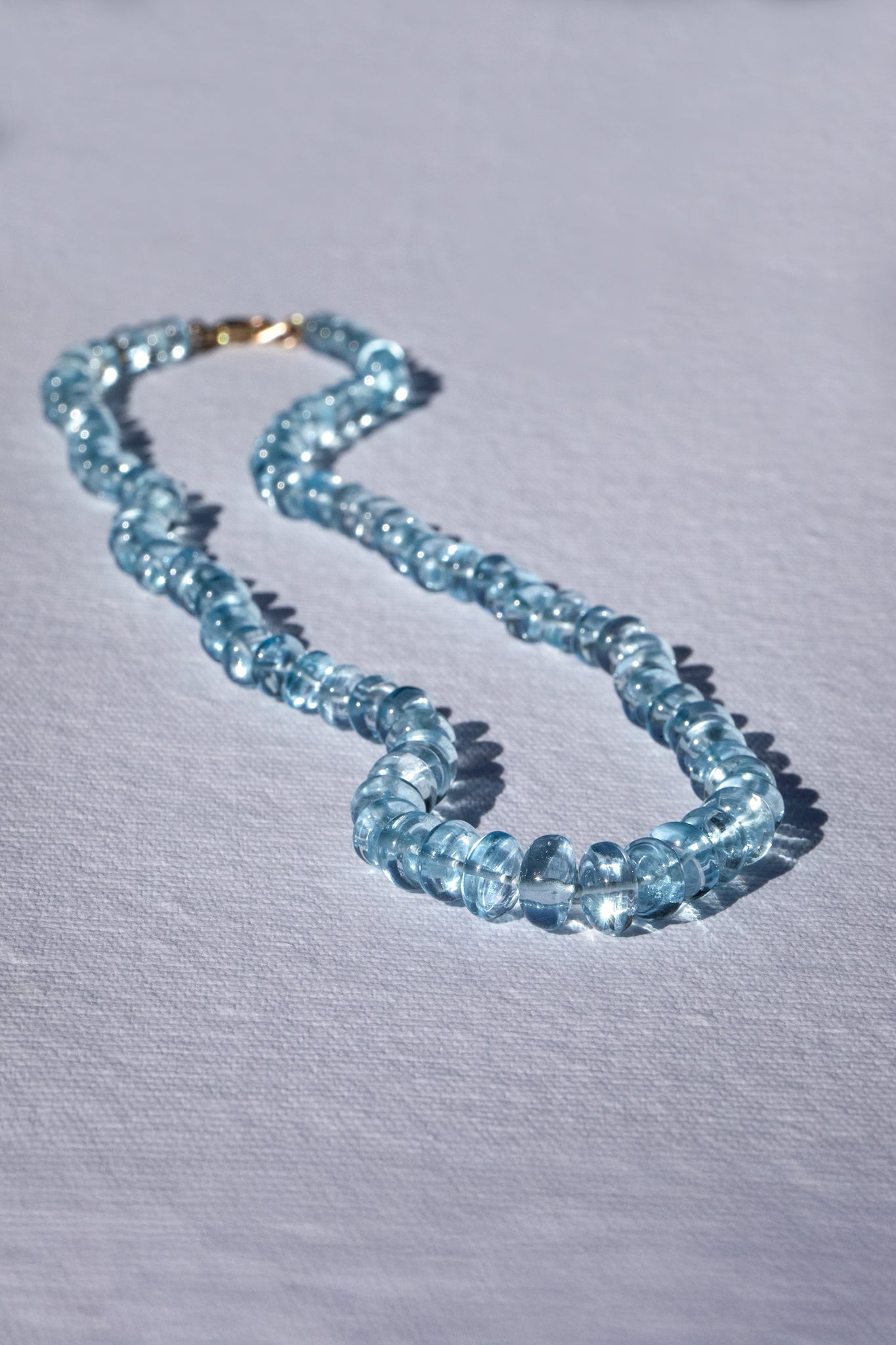 Sky Blue Blue Topaz Knotted Strand, 14k Gold