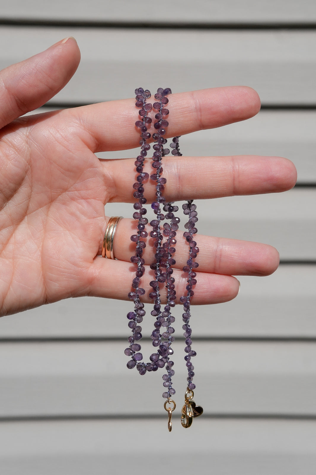 Violet Depth, Purple Sapphire Teardrop Strand in 14k Gold, a close look at the stones