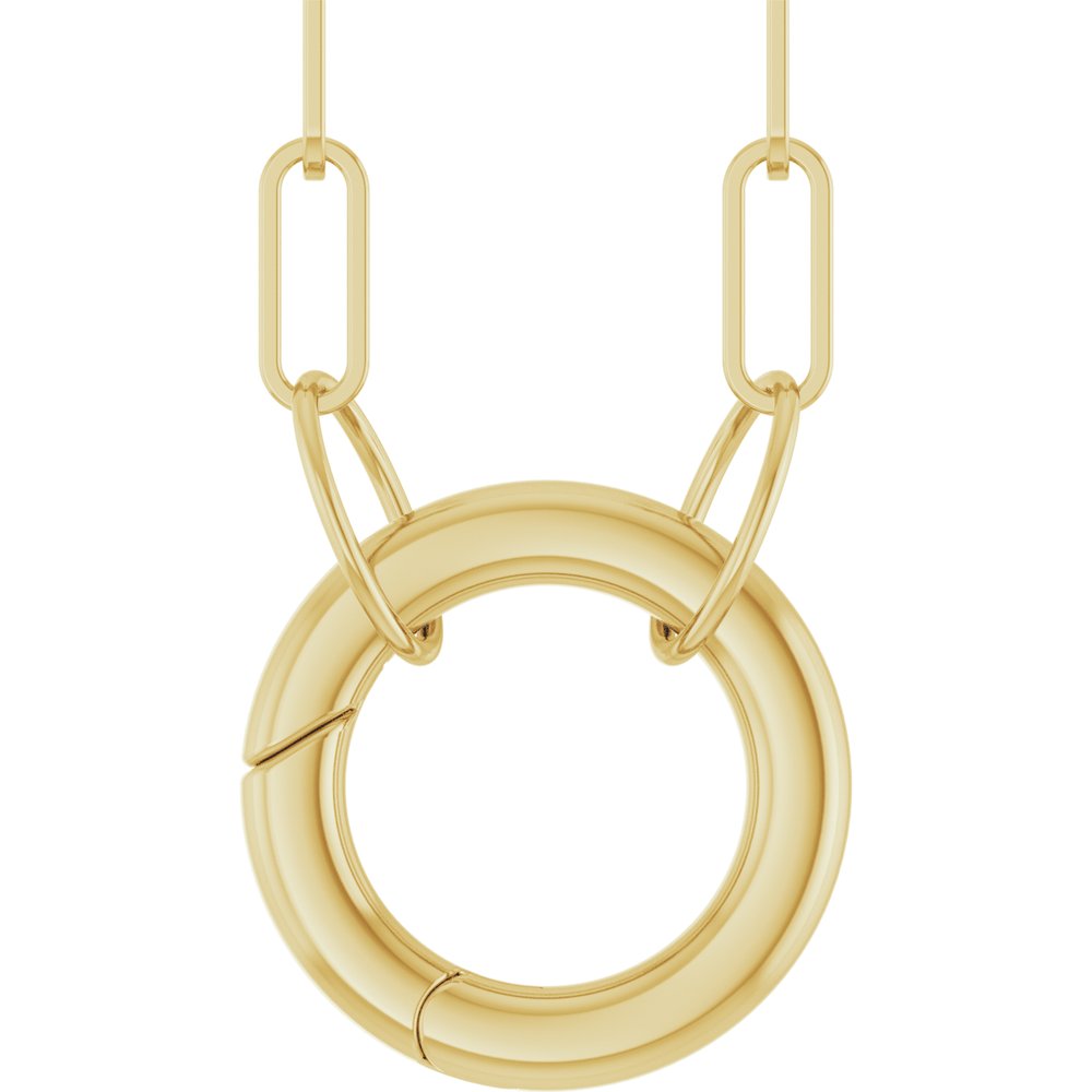 Gold necklace with a circular pendant on a white background