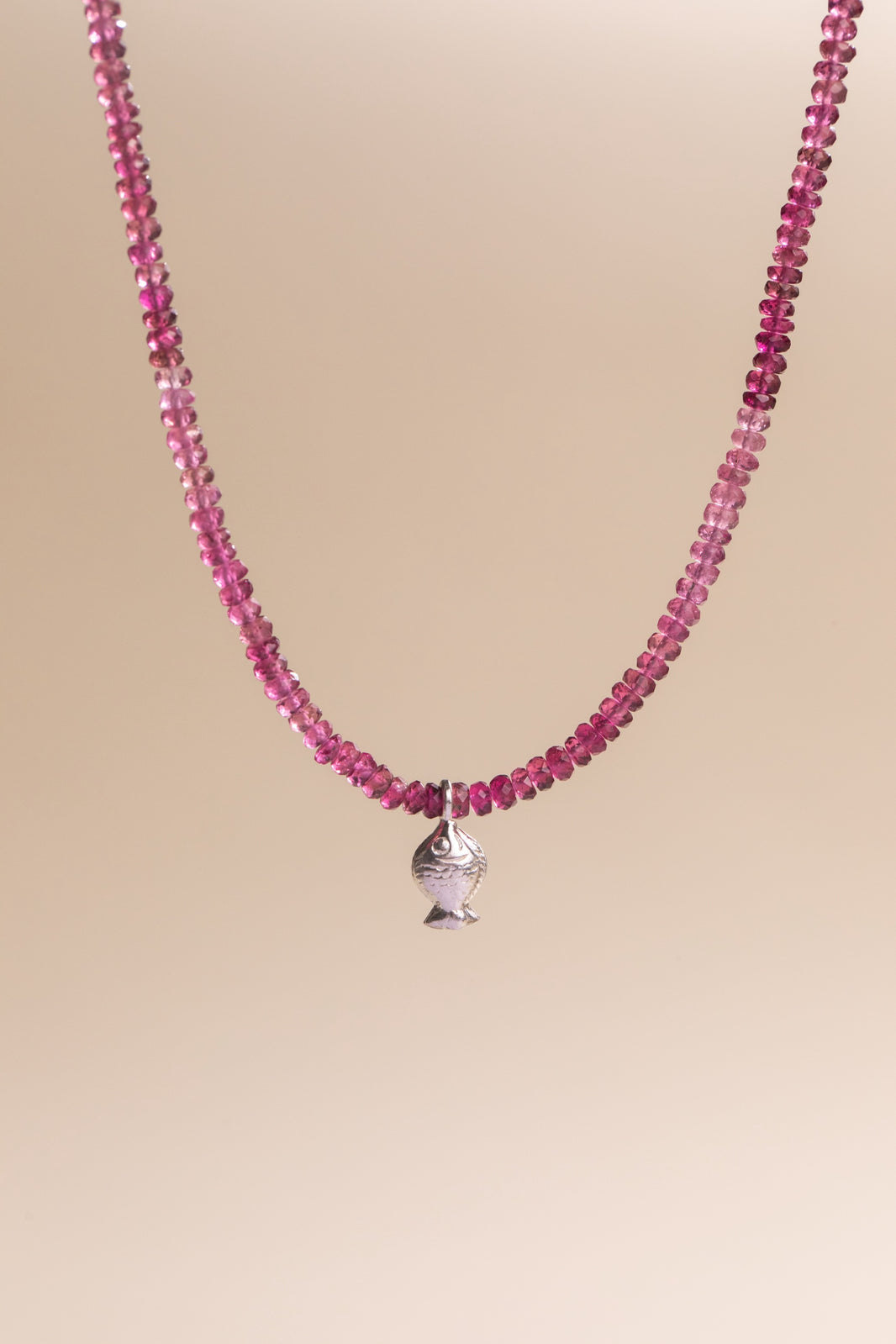 Vivid Pink Tourmaline Worry Fish Necklace Sterling Silver 17", a close look at the stones