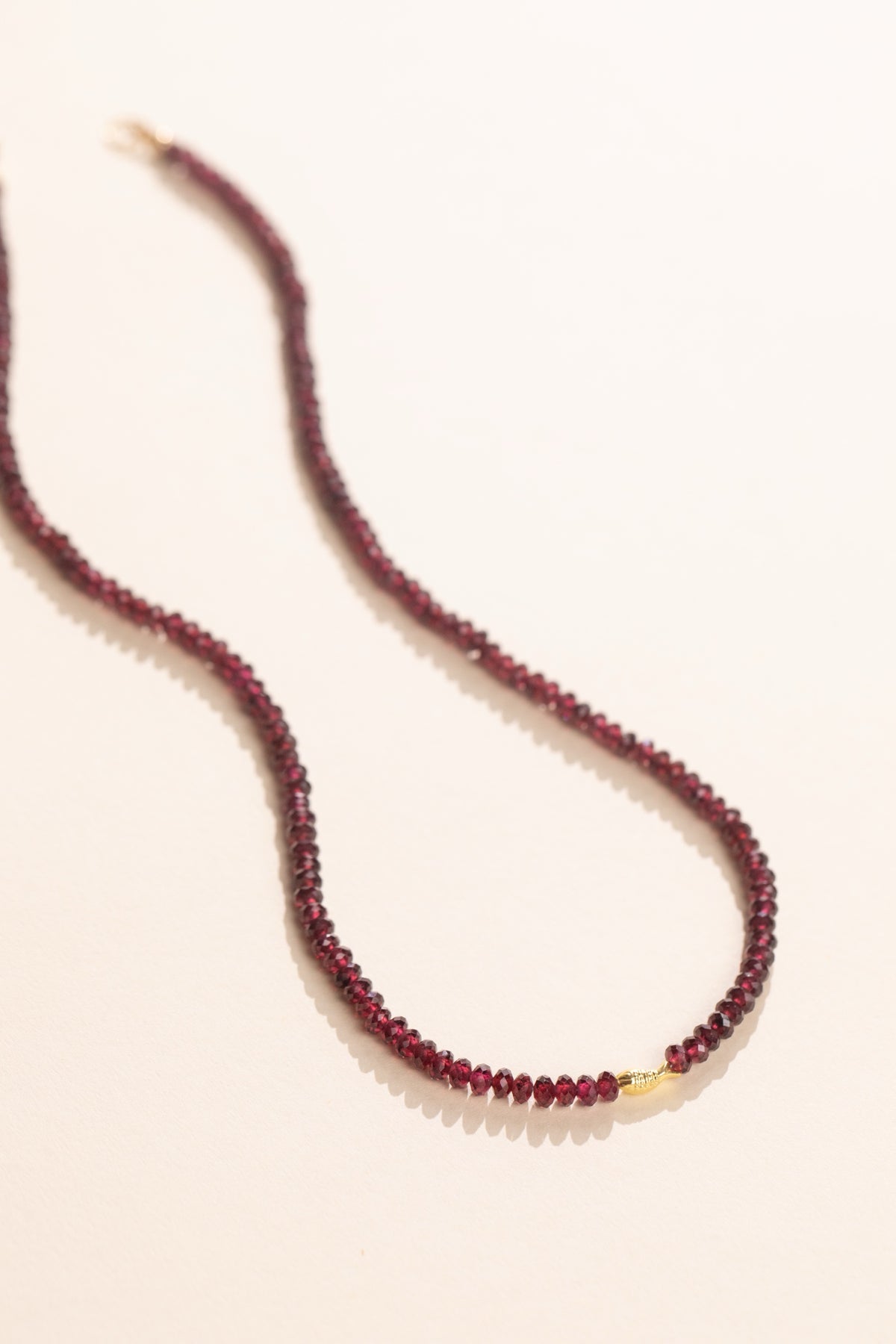 Pyrope Garnet Worry Fish Necklace with 14k gold spring ring clasp, view 3