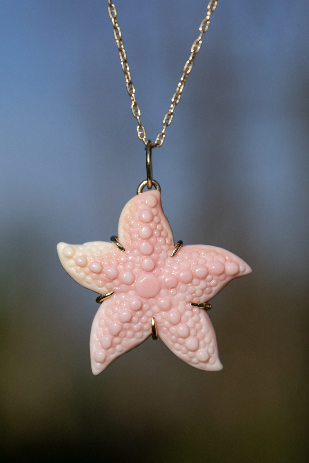 Carved Queen Conch Shell Starfish Pendant, 14k Gold, a close look at the stones